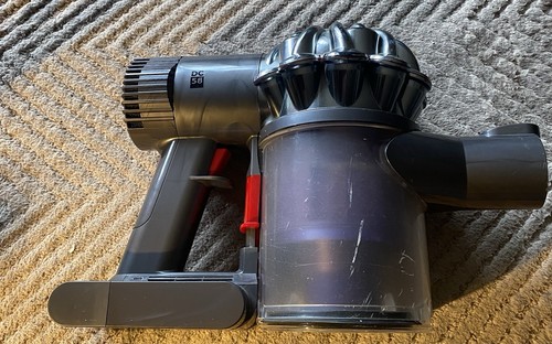 Dyson hand held hoover - hand,